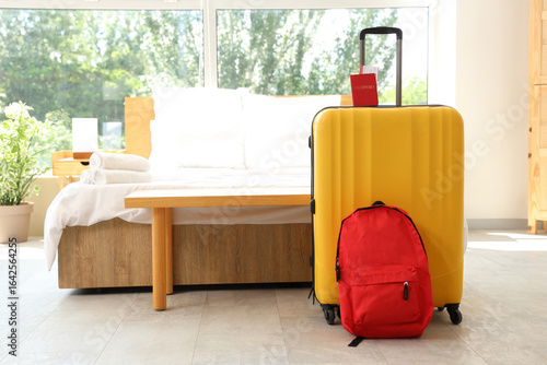 Suitcase with passport and ...
