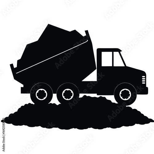 Black dump truck carrying debris construction hauling