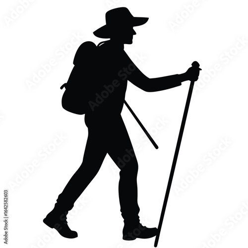 Hiker with backpack and trekking poles silhouette walking