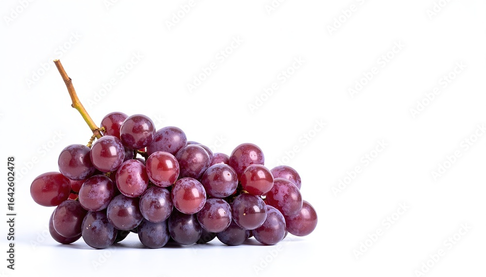 Fototapeta premium A vibrant bunch of plump, juicy grapes in various shades of green and purple, resting against a clean, bright white background, highlighting their freshness.