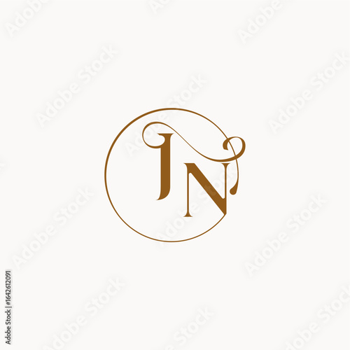 circle fows wedding logo monogram elegant style letter luxurius feeling with flow JN