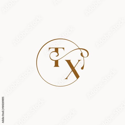 luxurius feeling with flow TX monogram elegant style letter circle fows wedding logo