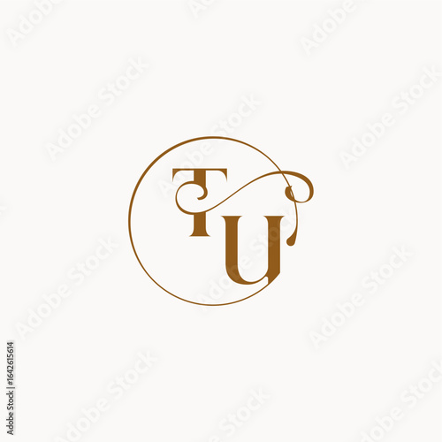 luxurius feeling with flow TU monogram elegant style letter circle fows wedding logo