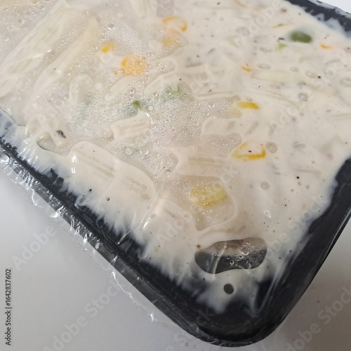 Delicious white sauce pasta close-up