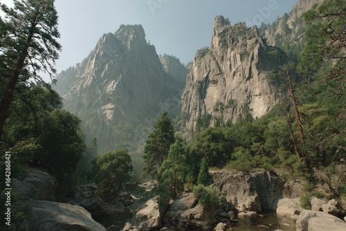 Mountain valley scene with granite peaks and lush forest