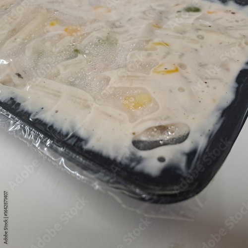 Delicious white sauce pasta close-up