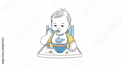 Adorable baby happily eating from a blue bowl with a spoon, wearing a cute whale bib and yellow shirt in a high chair