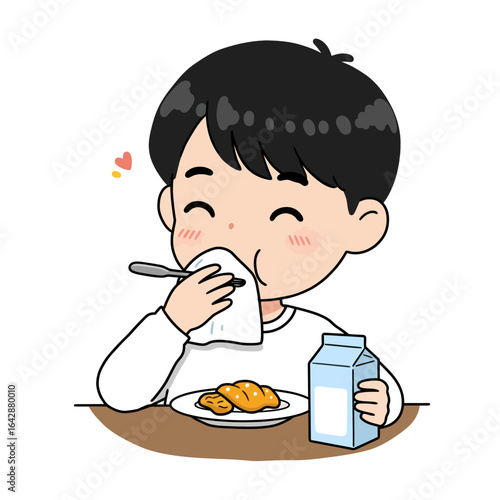 Adorable cartoon boy with black hair wiping his mouth while enjoying a croissant breakfast.