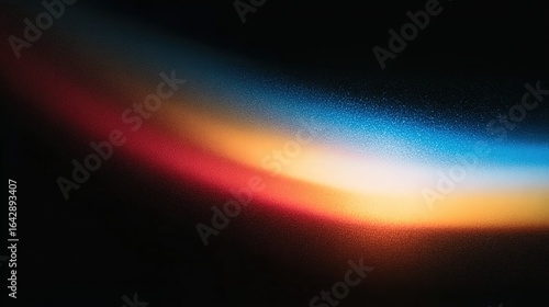 Abstract close-up of edge-lit gradient: Blue, red, yellow on black background, blurred, grainy with chromatic aberration. Ideal for digital art backgrounds, tech designs, or social media visuals.