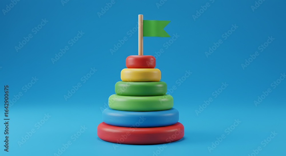 A colorful wooden toy pyramid with rings stacked on top of each other and a green flag on top A colorful wooden toy pyramid with rings stacked on top of each other and a green flag on top