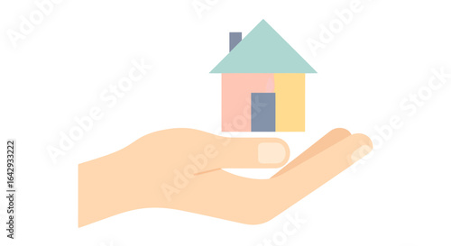 A tender hand delicately holds a whimsical, pastel-colored house, representing the warmth and security of home ownership.