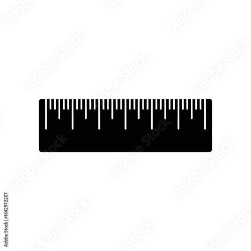 Black ruler with white measurement markings measuring tool
