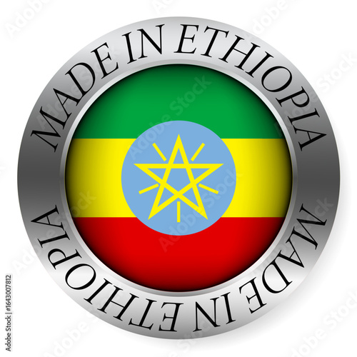 Made in Ethiopia button icon. Circular emblem with metallic border, glossy central flag, and bilingual label indicating product origin and international manufacturing identity.