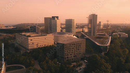 Drone footage of golden red sky of Kirchberg in Luxembourg