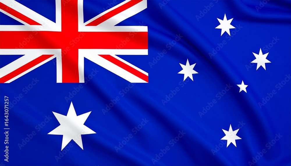 Fototapeta premium Australian national flag with vibrant blue background, Union Jack in the corner, and white stars representing the Commonwealth and Southern Cross, waving in the wind.