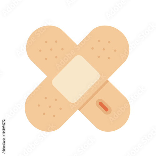 A close-up of a decorative adhesive bandage on a soft surface, showcasing its design