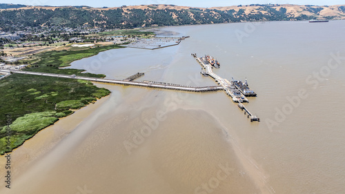 Quadro su tela aerial landscape view of area around Carquinez Strait, with large pier and marin