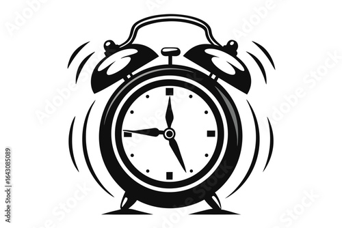 Black old fashioned alarm clock rings loudly on a white plain background