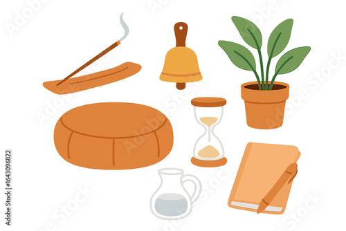 Relaxation items arranged on a table including an incense stick, bell, and plants for a calming environment
