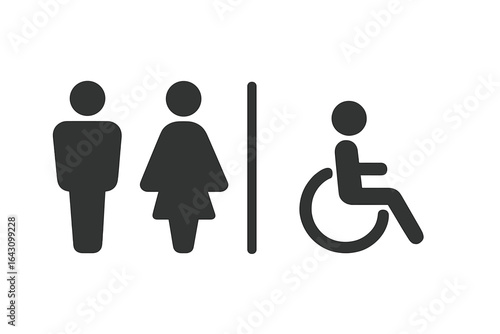 Restroom access signs for men, women, and individuals with disabilities displayed in a public building
