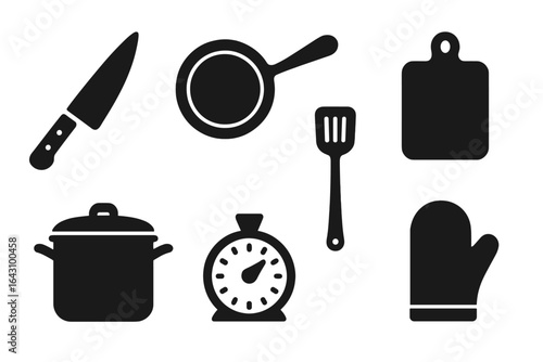 Kitchen utensils and tools displayed, showcasing essential items for cooking and food preparation in a home setting