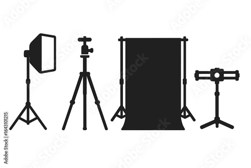 Studio lighting equipment arranged for a photoshoot setup in a creative workspace