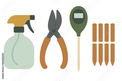 Tools for gardening projects including a spray bottle, pruning shears, and stakes in a workspace setting