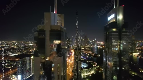 Wallpaper Mural Aerial night view of a vibrant city skyline showcasing illuminated skyscrapers and bustling streets Torontodigital.ca