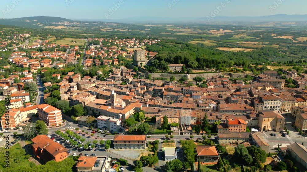 Castello di sarteano, a picturesque medieval town in tuscany, italy, reveals its charm from an aerial perspective, showcasing the surrounding landscape and the castle on a sunny day Castello di sarteano, a picturesque medieval town in tuscany, italy, reveals its charm from an aerial perspective, showcasing the surrounding landscape and the castle on a sunny day