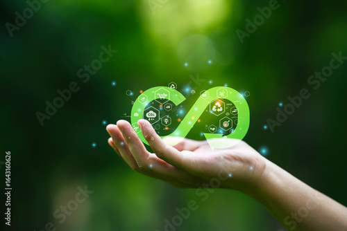 Wallpaper Mural Circular economy icon in hand to resource management, recycling, sustainable production, waste reduction, renewable energy, and environmental protection Torontodigital.ca