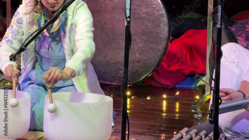 Live sound healing session with gongs, crystal bowls, and sacred instruments, creating deep relaxation, mindfulness, and spiritual connection through vibrations and meditative music.

