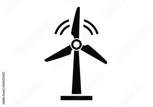 Silhouette of a wind turbine generating renewable energy as a clean and sustainable power source for the environment