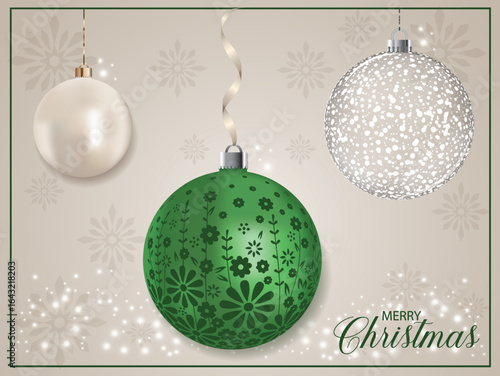 A green pearly Christmas ball with a floral motif.