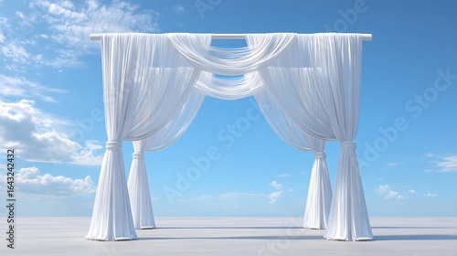 Elegant white wedding arch for a beautiful outdoor ceremony with drapes and romantic backdrop