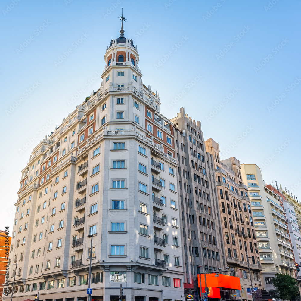 Fototapeta premium Tall neoclassical buildings in the downtown area of Madrid, Plaza de Spain.