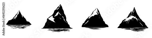 Mountain silhouettes rise over tranquil water at dusk creating a serene landscape full of natural beauty