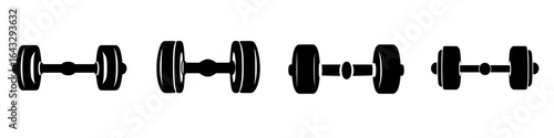 Various styles of dumbbells displayed in a fitness setting for weight training and strength building