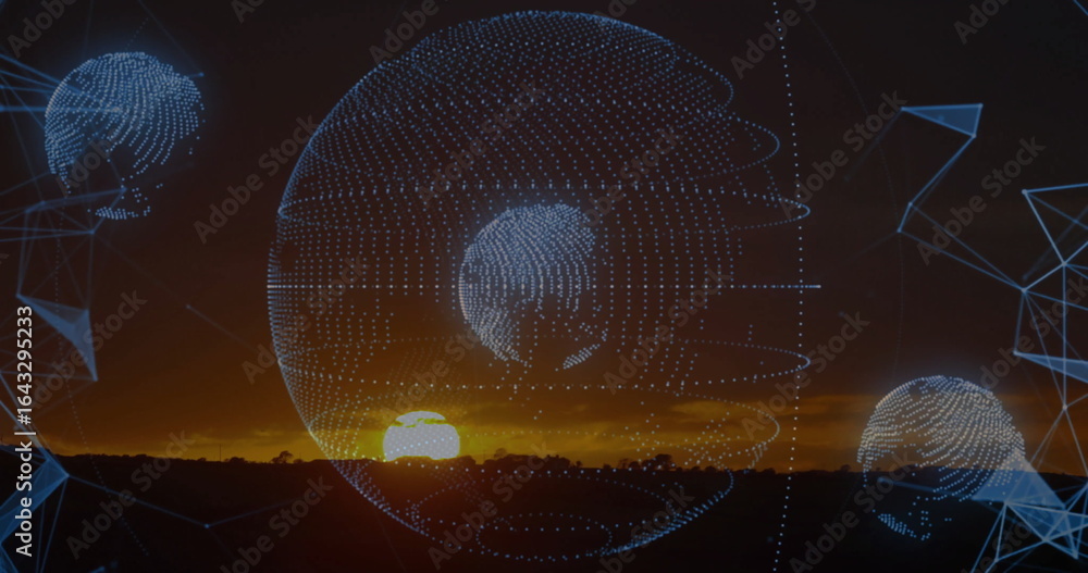 Obraz premium Showing central and smaller wireframe globes hovering over plain at sunset, with blue mesh shapes
