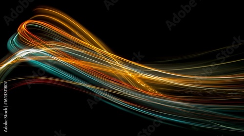 Abstract light trails creating vibrant colors against a dark background.