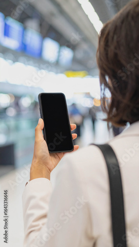  Person Holding Smartphone with Blank Screen for AI Chat