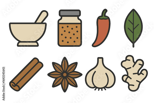 Colorful collection of kitchen spices and herbs with a mortar and pestle on a white background