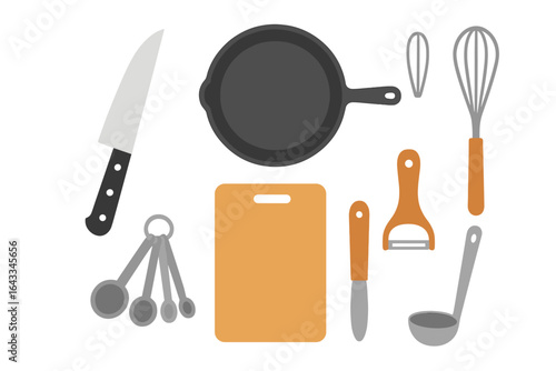 Essential cooking utensils and tools arranged for meal preparation in a modern kitchen setting
