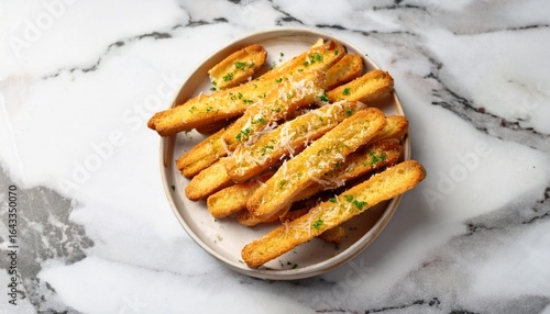 crunchy garlic crouton sticks topped with parmesan on marble surface gourmet snack idea perfect for a banner