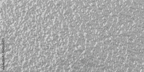 Abstract and textured grey surface ideal for backgrounds seamless design or digital art presentations with a granite or stone appearance