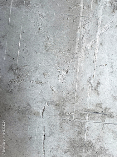Gray cement surface with visible texture, design background, texture or construction visuals