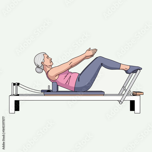An older woman is performing a Pilates exercise on a reformer machine in a fitness studio.