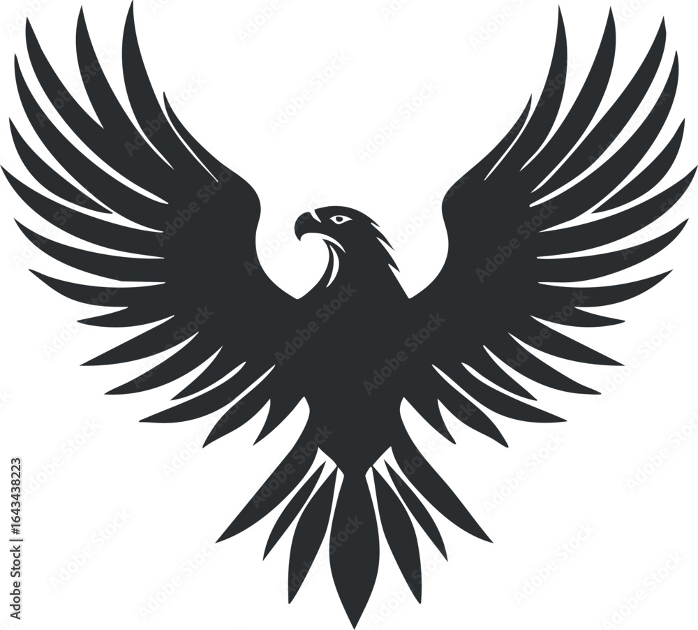 Obraz premium Black silhouette of an eagle with wings spread wide in flight, symbolizing power and freedom