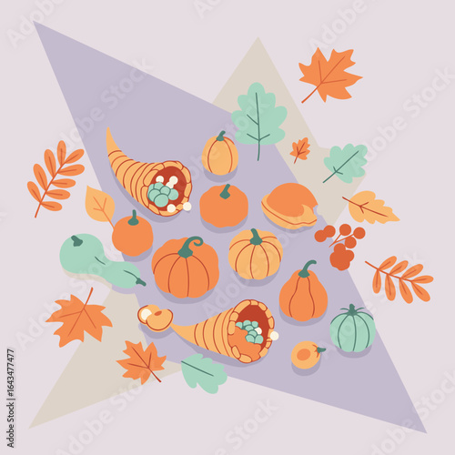 Thanksgiving cornucopia and fall harvest design with assorted pumpkins, gourds, and leaves. Flat lay display of autumnal bounty with various seasonal elements.