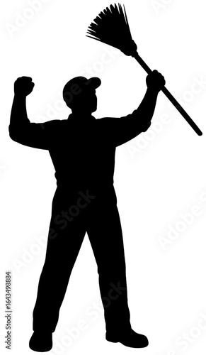 Silhouette of Worker Holding Broom in Celebration Pose