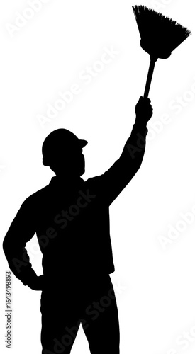 Silhouette of Worker Raising Broom in Victory